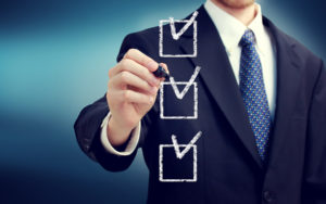 post merger integration checklist businessman
